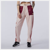 NB Athletics Higher Learning Wind Pant | New Balance Clothing Oyster Pink - Women
