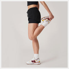 Bandier Woven tech Short | New Balance Clothing Black - Women