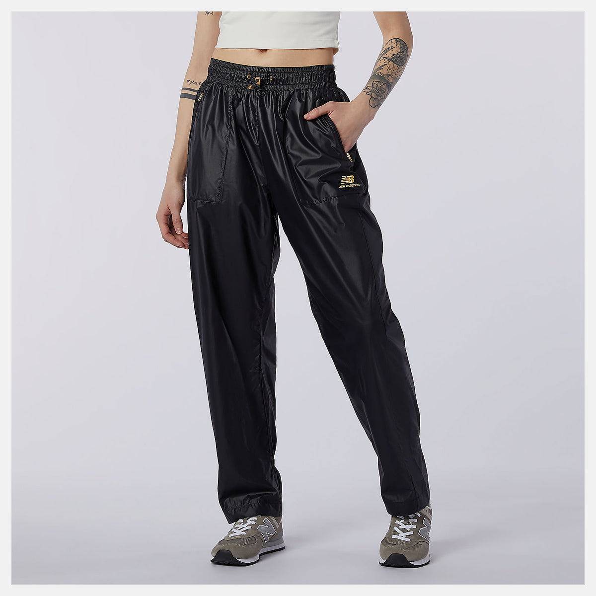 NB Athletics Higher Learning Wind Pant | New Balance Clothing Black - Women