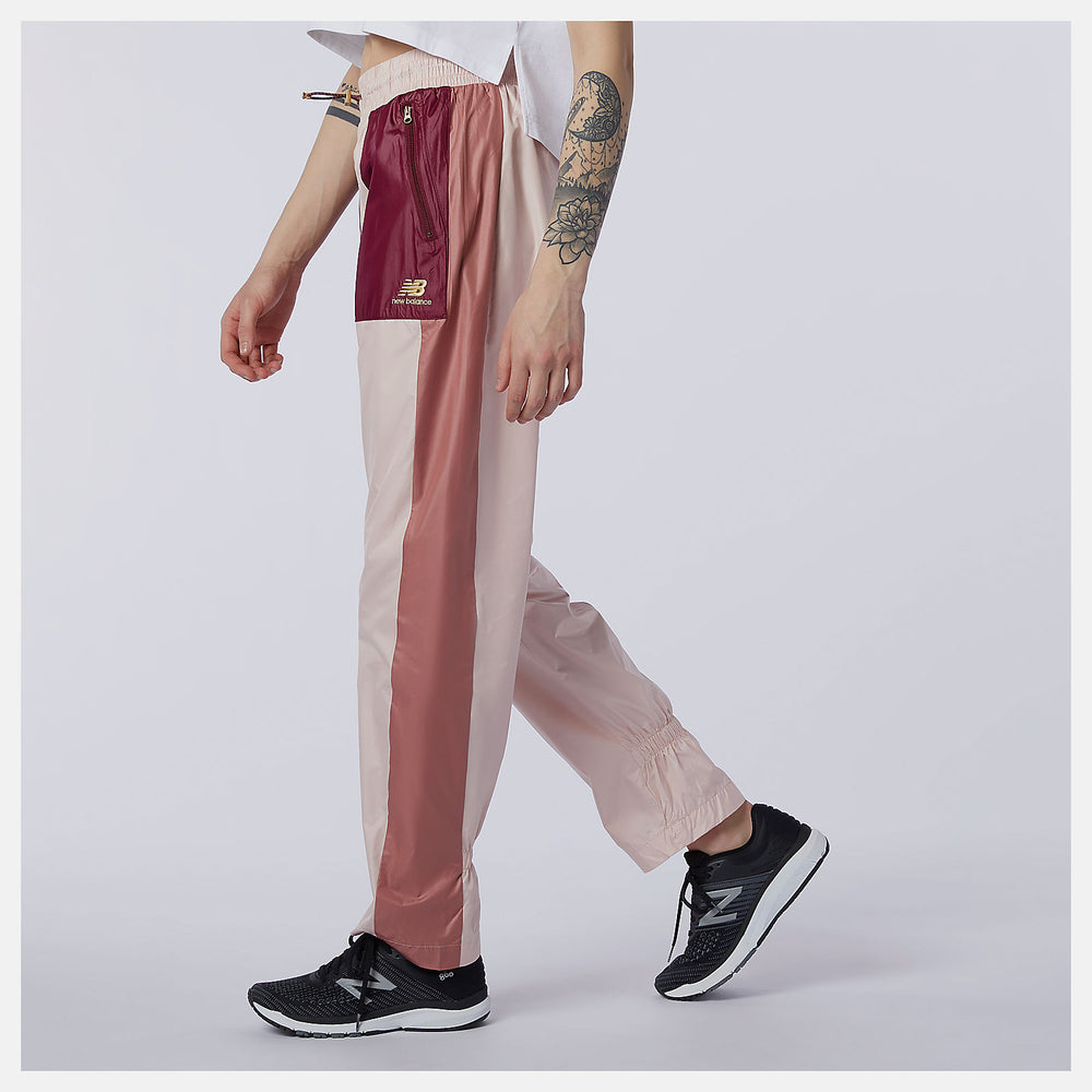 NB Athletics Higher Learning Wind Pant | New Balance Clothing Oyster Pink - Women